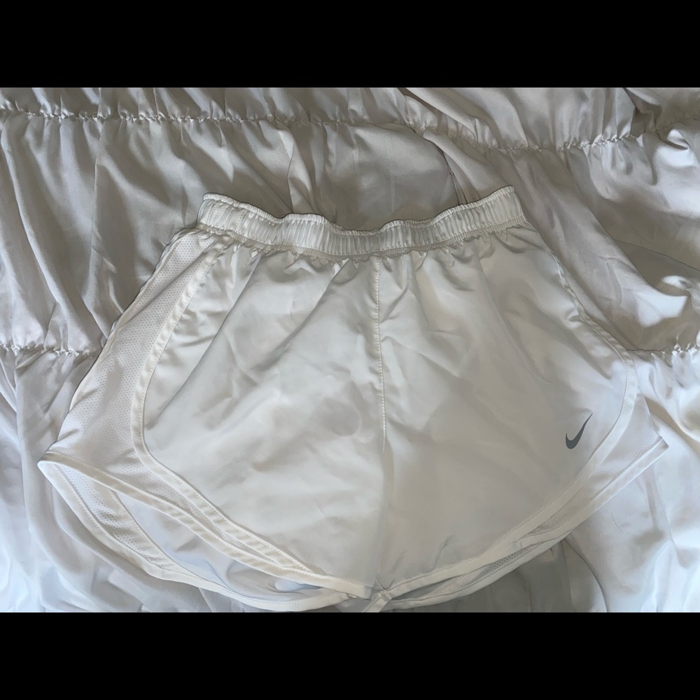 White Nike shorts